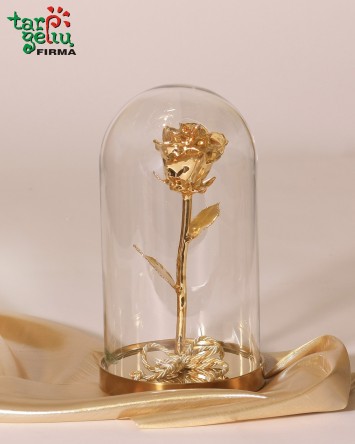 Golden rose in a flask